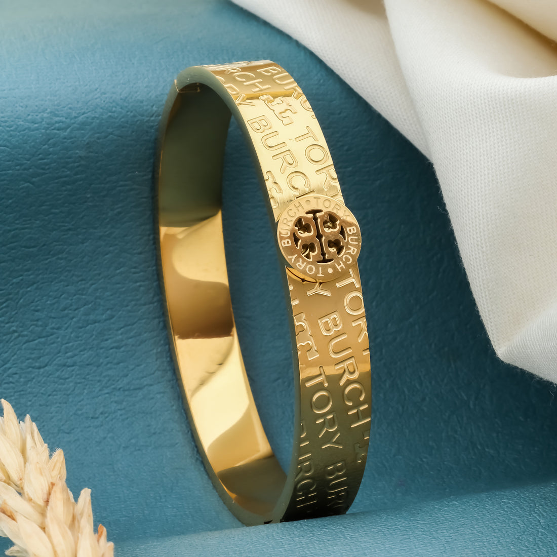 Designer Wordmark Hinge Bangle (Gold )